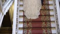 Bride and groom upping the stairs