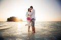 bride and groom walk barefoot at spit Royalty Free Stock Photo