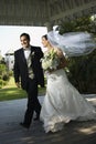 Bride and groom walking