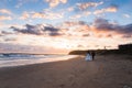 Bride and groom walking on a beach in Africa Royalty Free Stock Photo