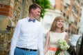 Bride and groom walking down the street in Paris Royalty Free Stock Photo