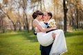 Bride and groom walking at the river Royalty Free Stock Photo