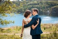 Bride and groom walking at the river Royalty Free Stock Photo