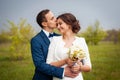 Bride and groom walking at the river Royalty Free Stock Photo