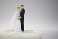 Wedding day concept bride and groom cake toppers