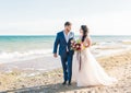 Bride and groom at wedding ceremony near sea Royalty Free Stock Photo