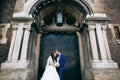 Bride and groom at wedding Day embracing with love. Happy romantic young couple celebrating their marriage in church Royalty Free Stock Photo