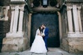 Bride and groom at wedding Day embracing with love. Happy romantic young couple celebrating their marriage in church Royalty Free Stock Photo