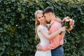 Bride and groom at wedding Day walking Outdoors on spring nature. Bridal couple, Happy Newlywed woman and man embracing Royalty Free Stock Photo