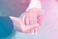 The bride and groom at the wedding put their hands to each other. Close-up. Romantic concept Royalty Free Stock Photo