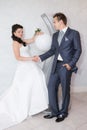 Bride and groom on the wedding walk in the modern hotel hall Royalty Free Stock Photo