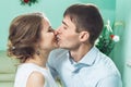 Bride and groom in a white dress kissing Royalty Free Stock Photo