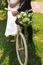 Bride and groom with a white wedding bike Royalty Free Stock Photo