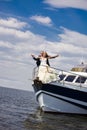 Bride and groom on a yacht Royalty Free Stock Photo