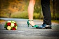 Bride on grooms feet Royalty Free Stock Photo