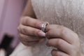 Bride hand with ring and nice flowers Royalty Free Stock Photo