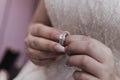 Bride hand with ring and nice flowers