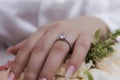 Bride hand with ring and nice flowers Royalty Free Stock Photo