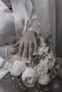 Bride hand with ring and nice flowers Royalty Free Stock Photo