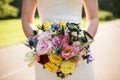 Bride hands with Wedding beautiful bouquet close-up