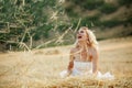 Bride in hay stack Royalty Free Stock Photo