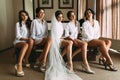 Bride with her lovely bridesmaids in the shirts Royalty Free Stock Photo