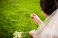 Bride on her wedding day with lucky fortune clover Royalty Free Stock Photo