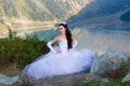 bride in her wedding dress on mountain Royalty Free Stock Photo