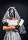Bride in hockey mask with meat cleaver