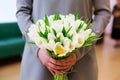 Bride holding beautiful wedding bouquet with white tulips Royalty Free Stock Photo