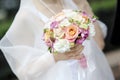 Bride holding beautiful wedding flowers bouquet