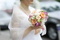 Bride holding beautiful wedding flowers bouquet