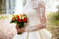 Bride holding big wedding bouquet on wedding ceremony Royalty Free Stock Photo