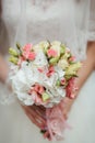 Bride holding big wedding bouquet on wedding ceremony Royalty Free Stock Photo