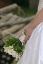 Bride holding boquet Royalty Free Stock Photo