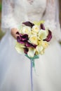 Bride holding bouquet of Calla lilies Royalty Free Stock Photo