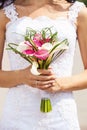 Bride holding bouquet of deep-bo Royalty Free Stock Photo