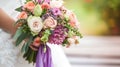 A bride holding a bouquet of flowers in her hand Royalty Free Stock Photo