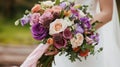 A bride holding a bouquet of flowers in her hand Royalty Free Stock Photo