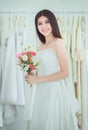 Bride holding a bouquet on hand for wedding,Beautiful asian woman smiling and happy,Romantic and sweet moment Royalty Free Stock Photo