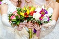 Bride holding bouquets