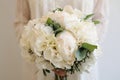 Bride Holding a Colorful Wedding Flower Bouquet of White Hydrangea, Peonies and Roses Royalty Free Stock Photo