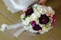 Bride Holding a Colorful Wedding Flower Bouquet of White Hydrangea, Peonies and Roses Royalty Free Stock Photo