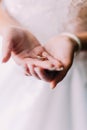 Bride holding engagement ring on her hands Royalty Free Stock Photo