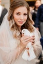 The bride is holding a pair of white pigeons. Royalty Free Stock Photo