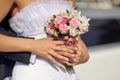 Bride holding pink wedding bouquet Royalty Free Stock Photo