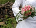 Bride holding wedding bouquet Royalty Free Stock Photo