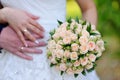 The bride holding wedding bouquet of pink and white roses Royalty Free Stock Photo