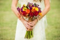 Bride holding wedding bouquet Royalty Free Stock Photo