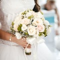 Bride holding wedding bouquet at a wedding ceremony Royalty Free Stock Photo